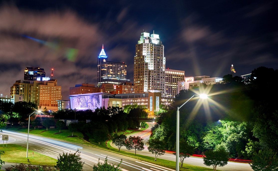 The Raleigh skyline at night.